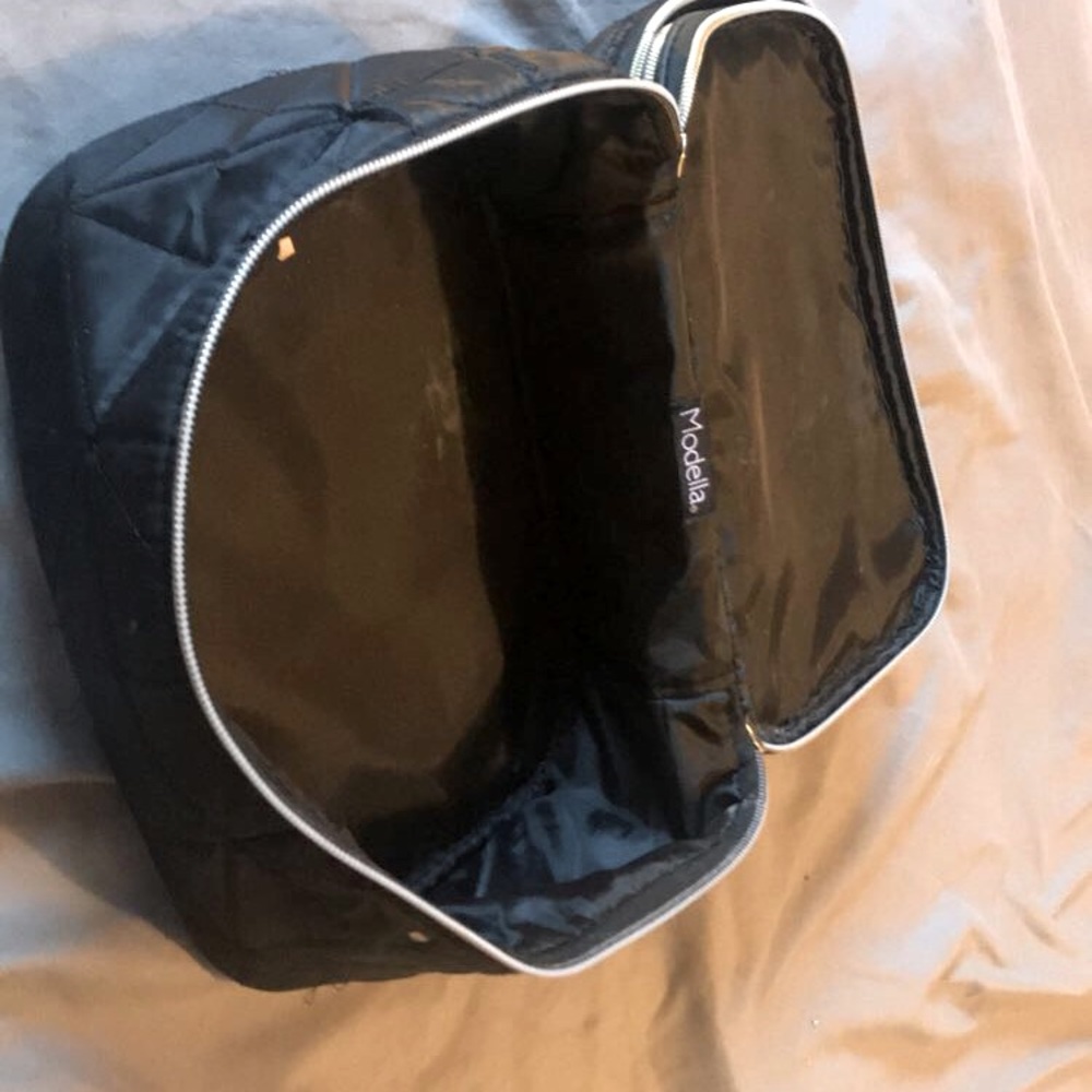 Black Modella makeup bag.